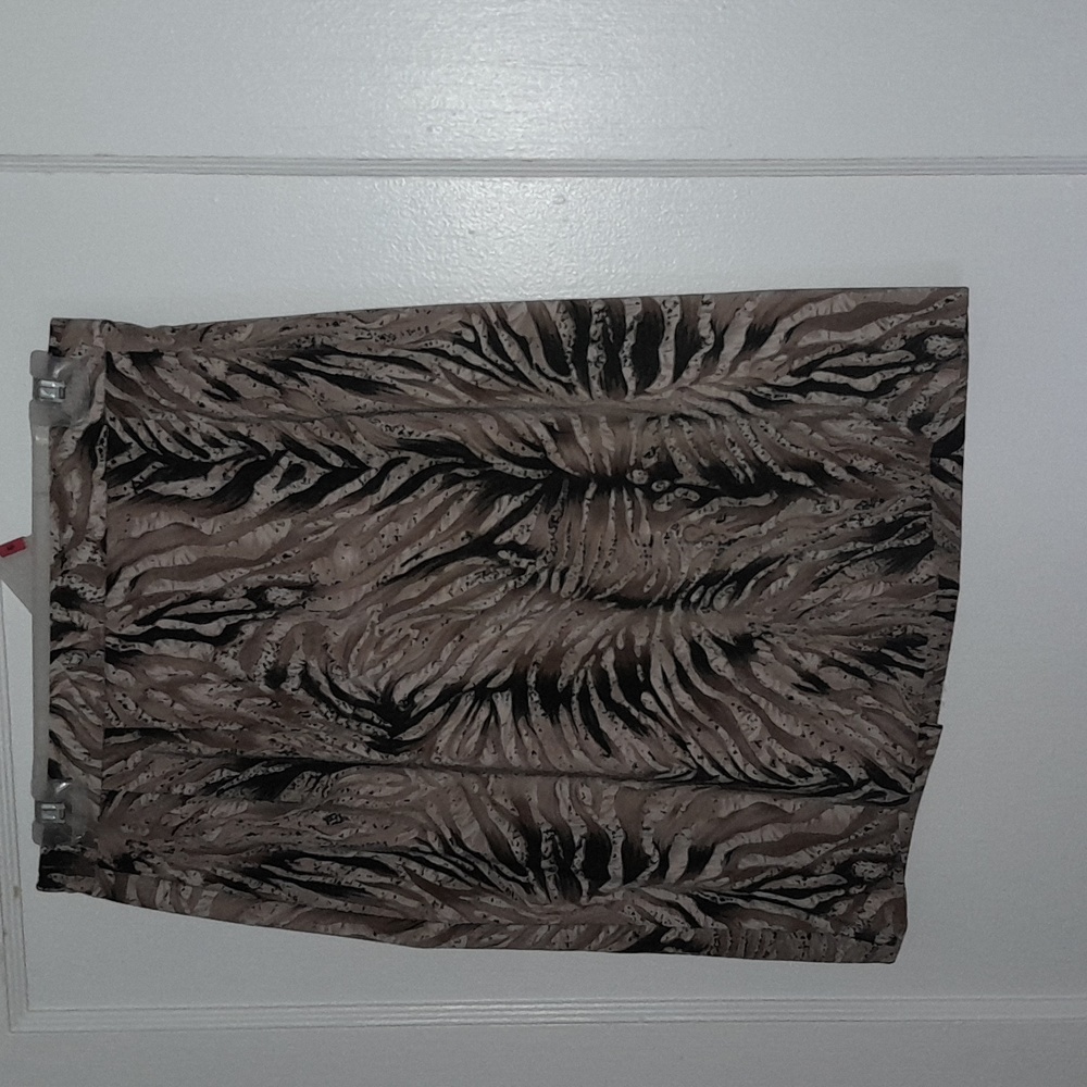 Women's size 10 John Roberts animal print skirt.